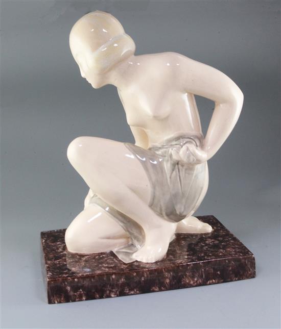 A French Art Deco crackle-glazed pottery model of a kneeling lady, signed M de Thierry, height 50cm